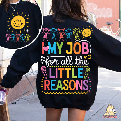 a woman walking down a street wearing a sweatshirt that says, my job for all