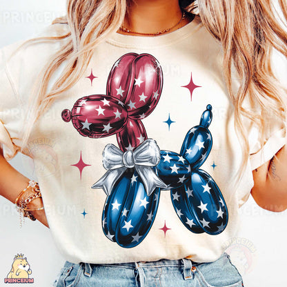 a woman wearing a white shirt with red, white and blue balloons on it