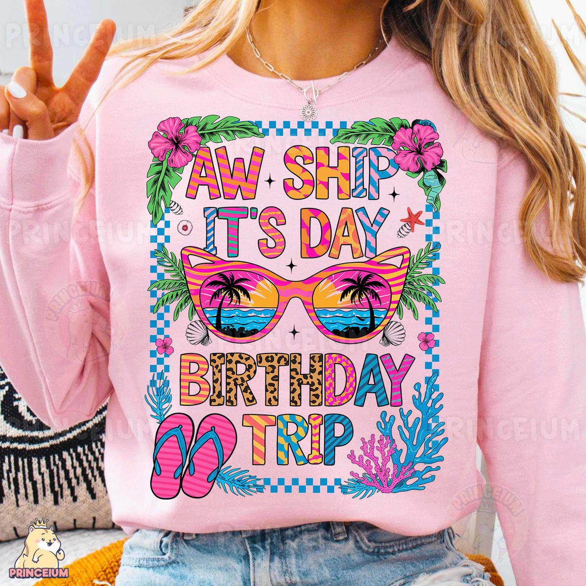 a woman wearing a pink shirt that says aw ship it's day birthday trip