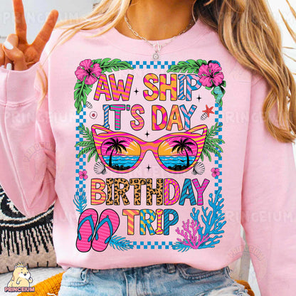 a woman wearing a pink shirt that says aw ship it's day birthday trip