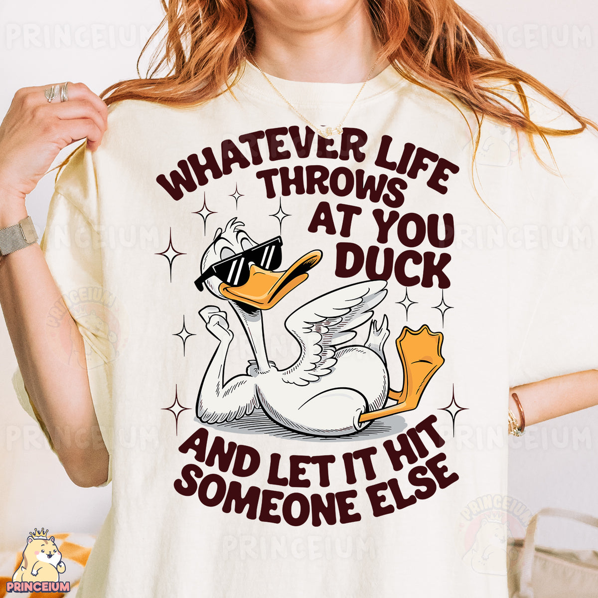 a woman wearing a t - shirt that says whatever life throws at you duck and