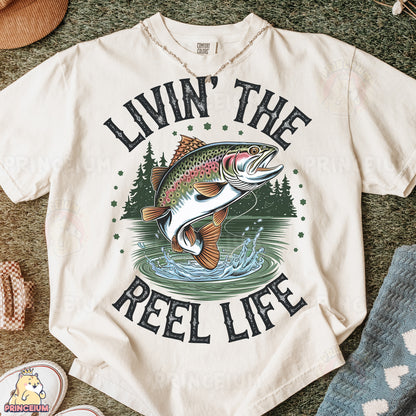 a t - shirt that says livn'the reel life with a fish on