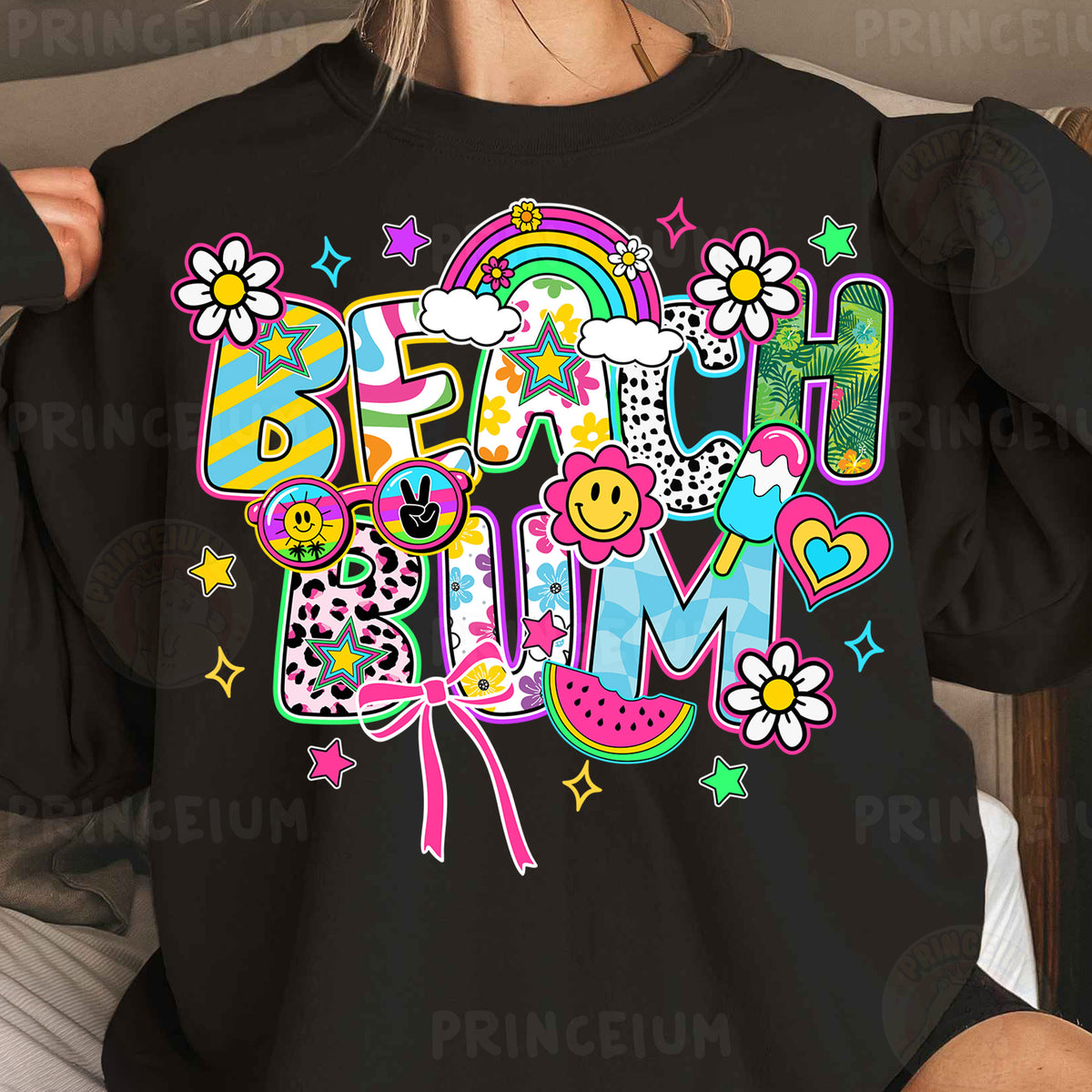a woman wearing a black shirt with a colorful design on it