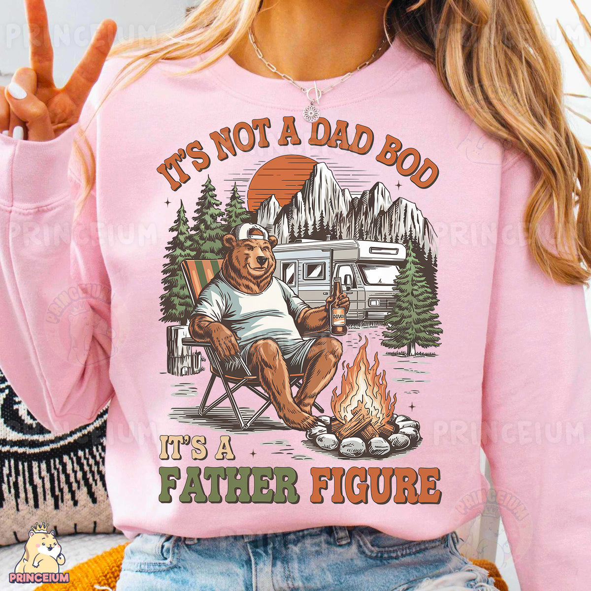a woman wearing a pink shirt that says it's not a dad bod