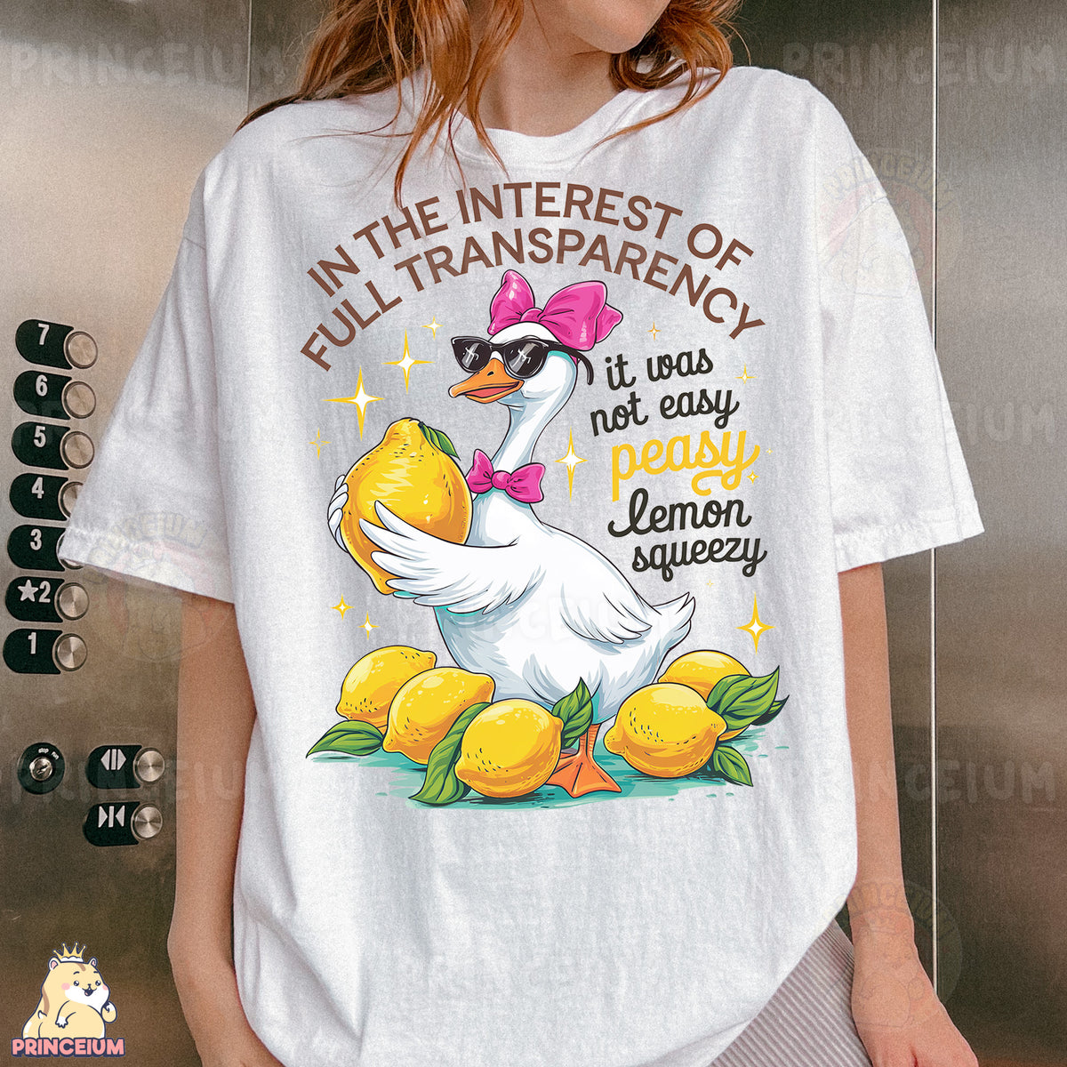 a woman wearing a white shirt with a duck on it
