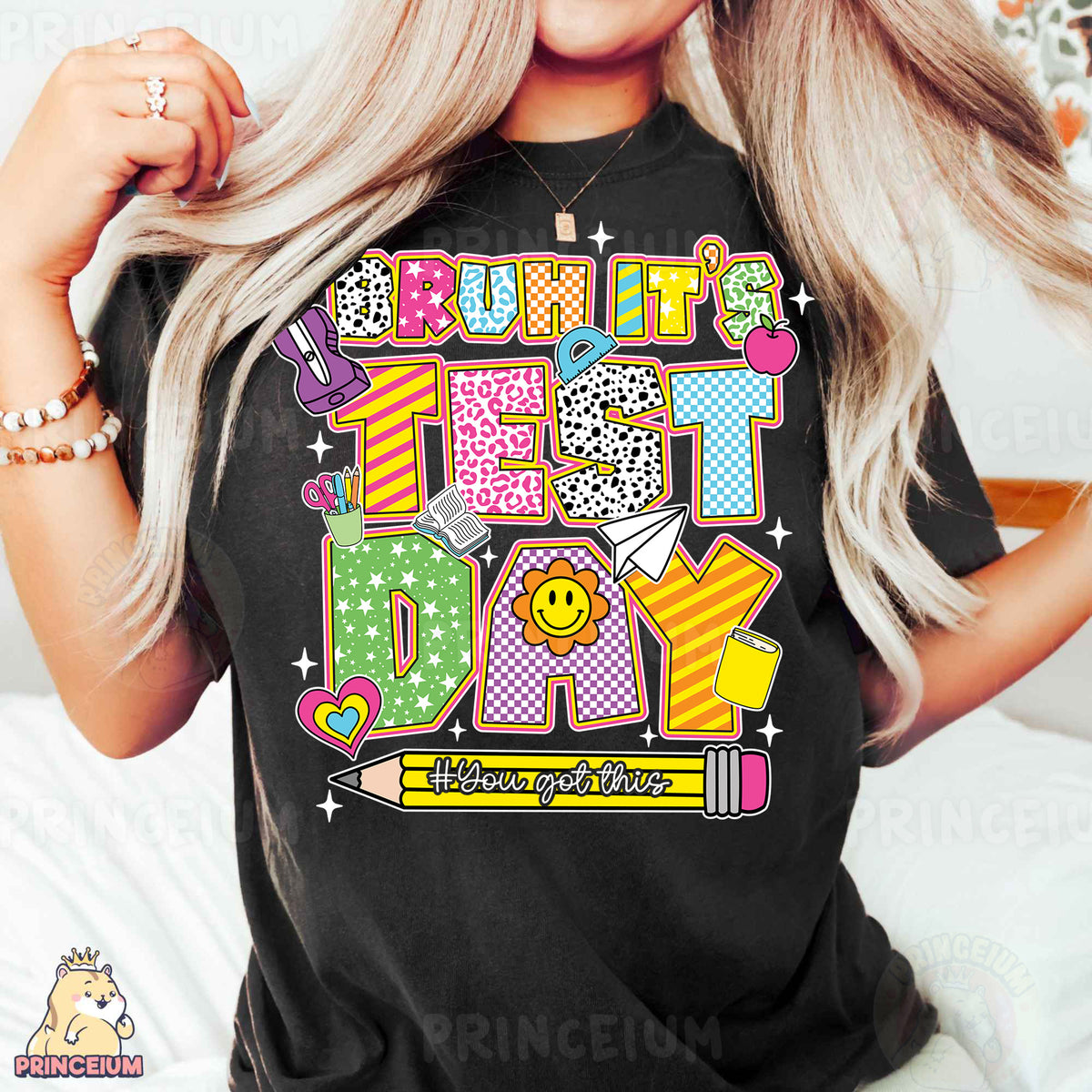 a woman wearing a black tshirt with a happy birthday message
