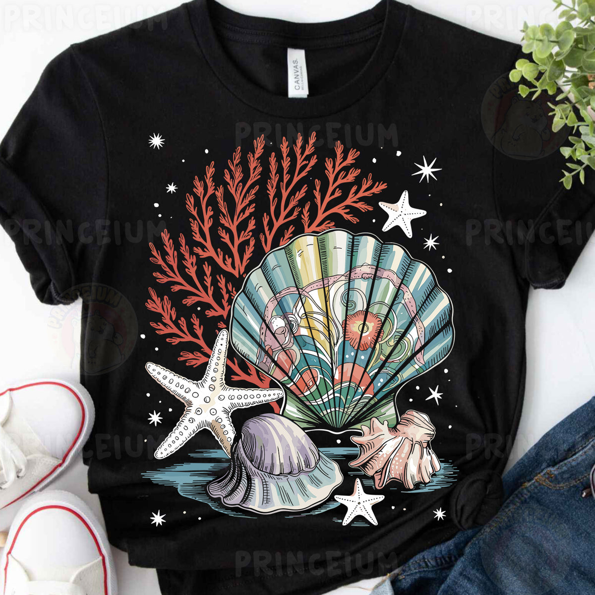 a t - shirt with a seashell and starfish on it