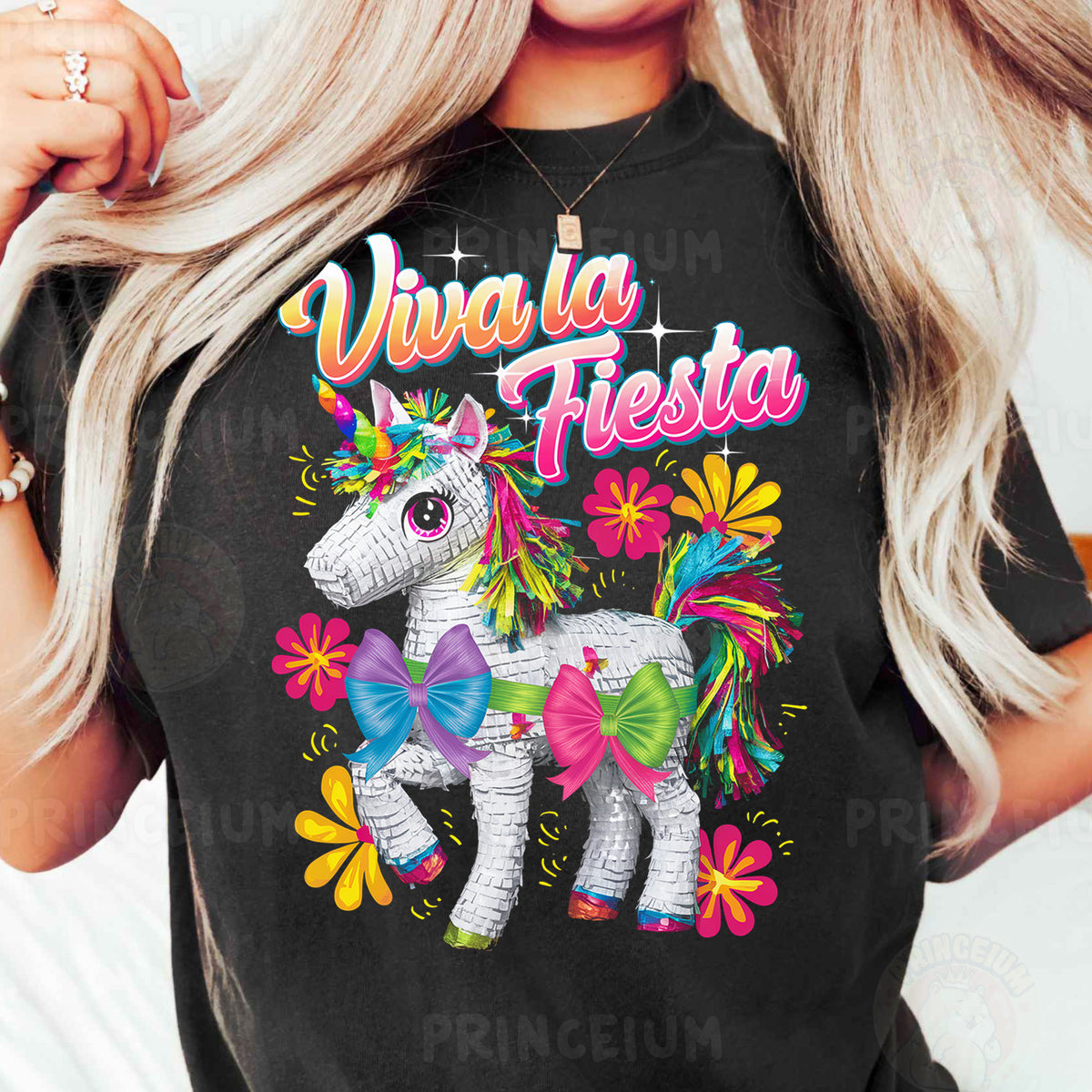 a woman wearing a black shirt with a unicorn on it