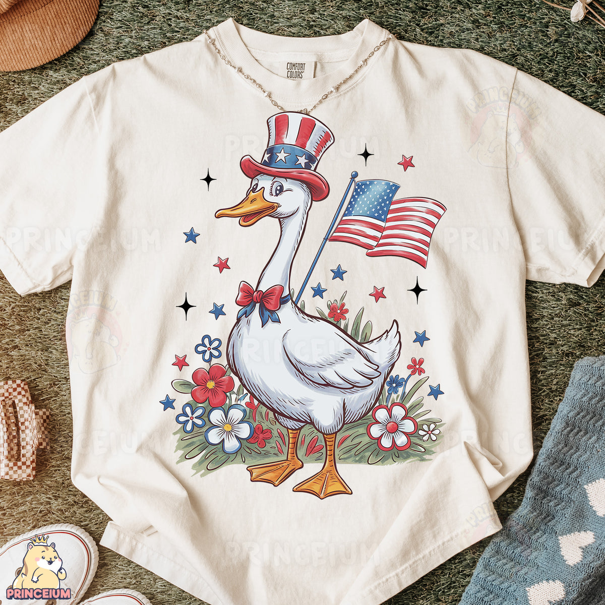 a t - shirt with a duck wearing a hat and an american flag on it