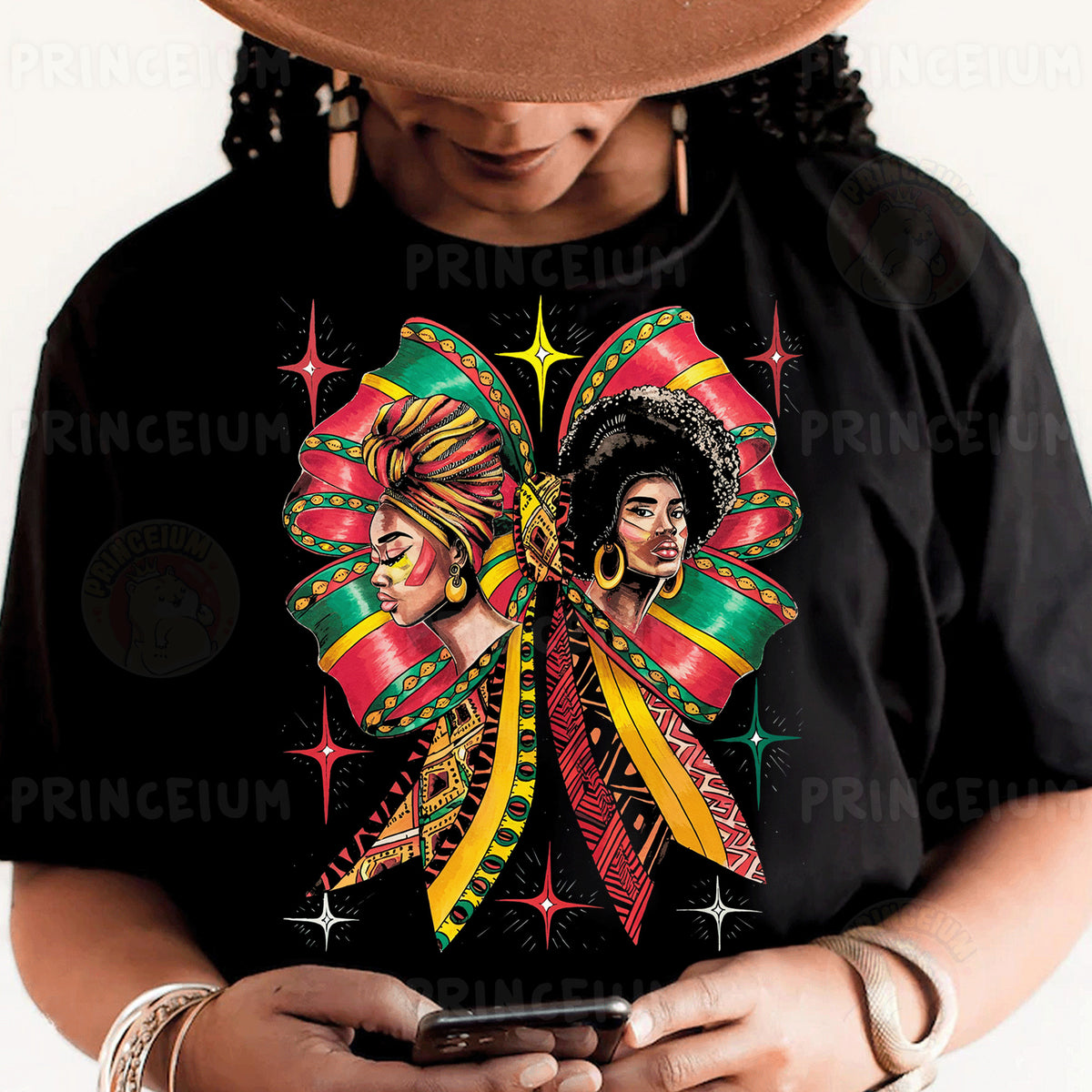 a woman wearing a black shirt and a hat holding a cell phone
