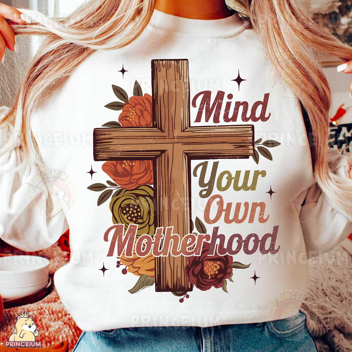 a woman wearing a t - shirt with a cross on it