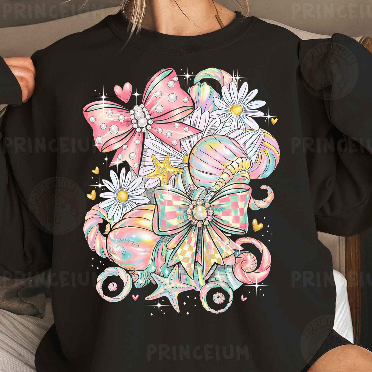 a woman wearing a black shirt with a pink bow and flowers on it