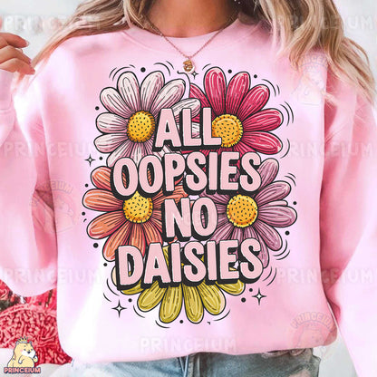 a woman wearing a pink sweatshirt that says all oopsies no daisies