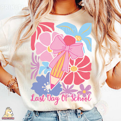 a woman wearing a t - shirt that says last day of school