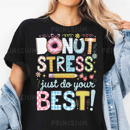 a woman wearing a black t - shirt that says donut stress just do your