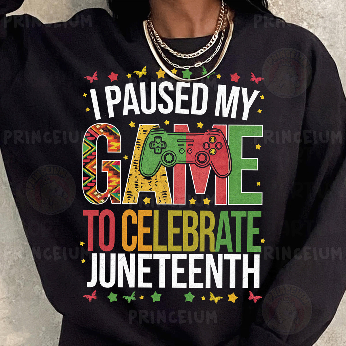 a woman wearing a black sweatshirt that says i paused my game to celebrate junetee