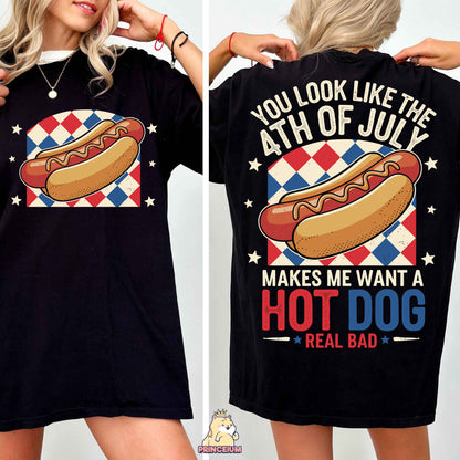 a woman wearing a black shirt with a hot dog on it