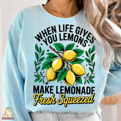 a woman wearing a sweatshirt that says when life gives you lemons make lemonade