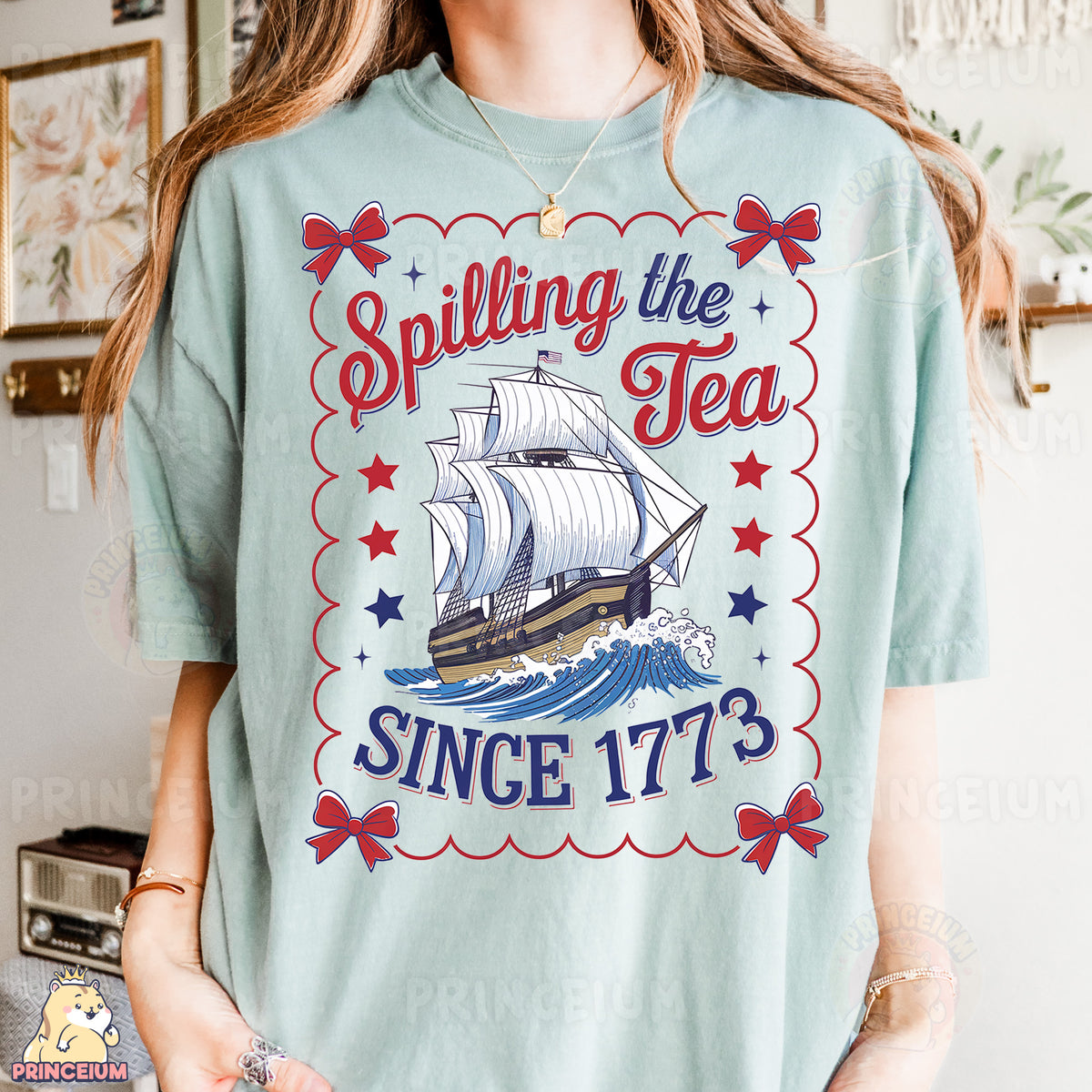 a woman wearing a t - shirt with a ship on it