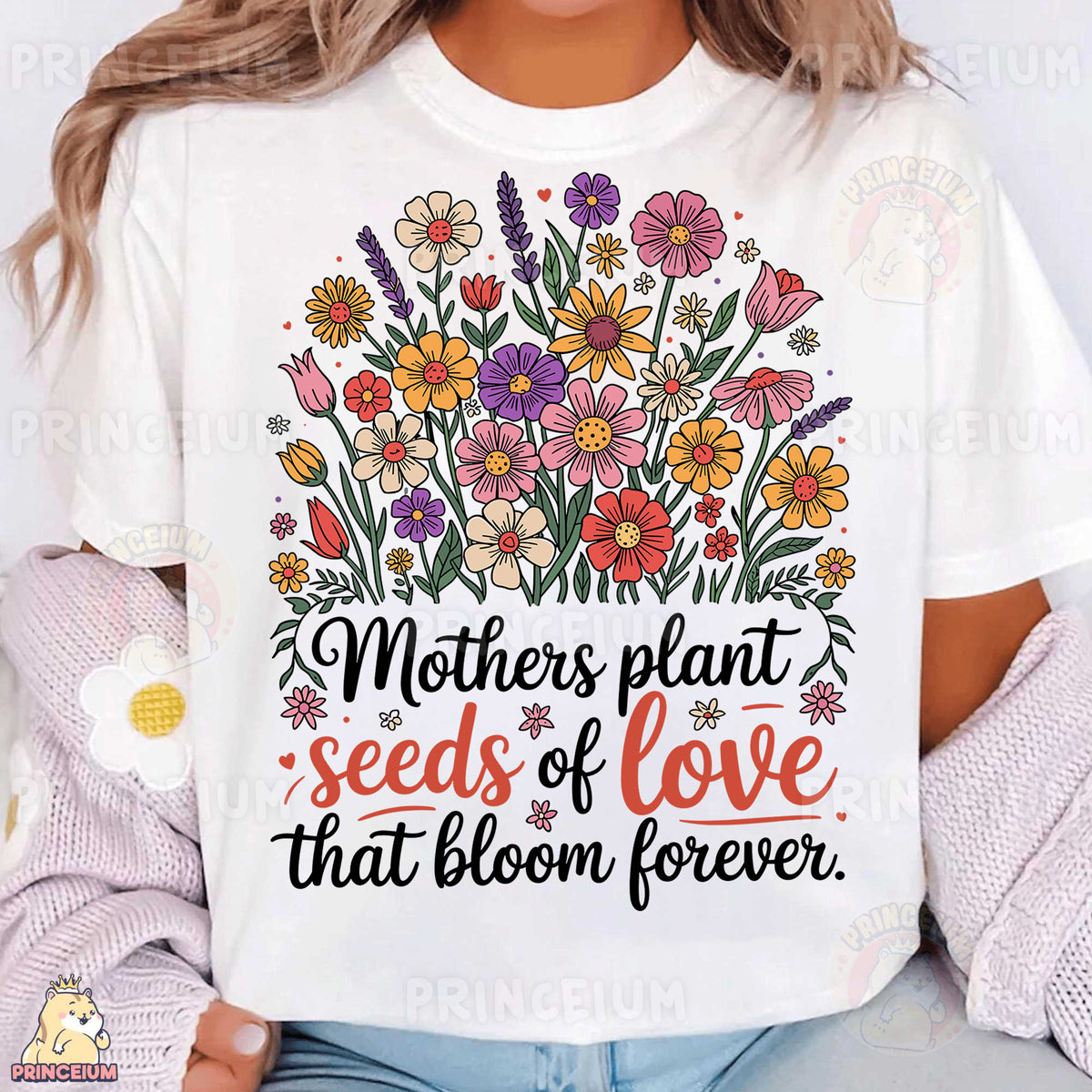 a woman wearing a t - shirt that says mothers plant seeds of love that bloom