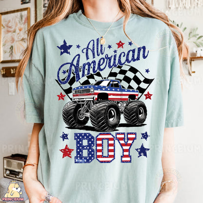 a woman wearing a blue shirt with a monster truck on it