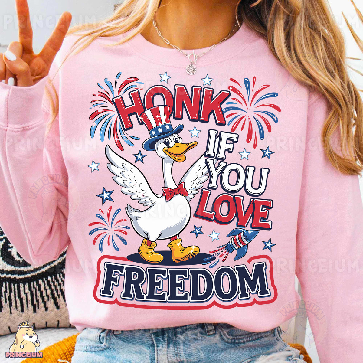 a woman wearing a pink shirt with a duck on it