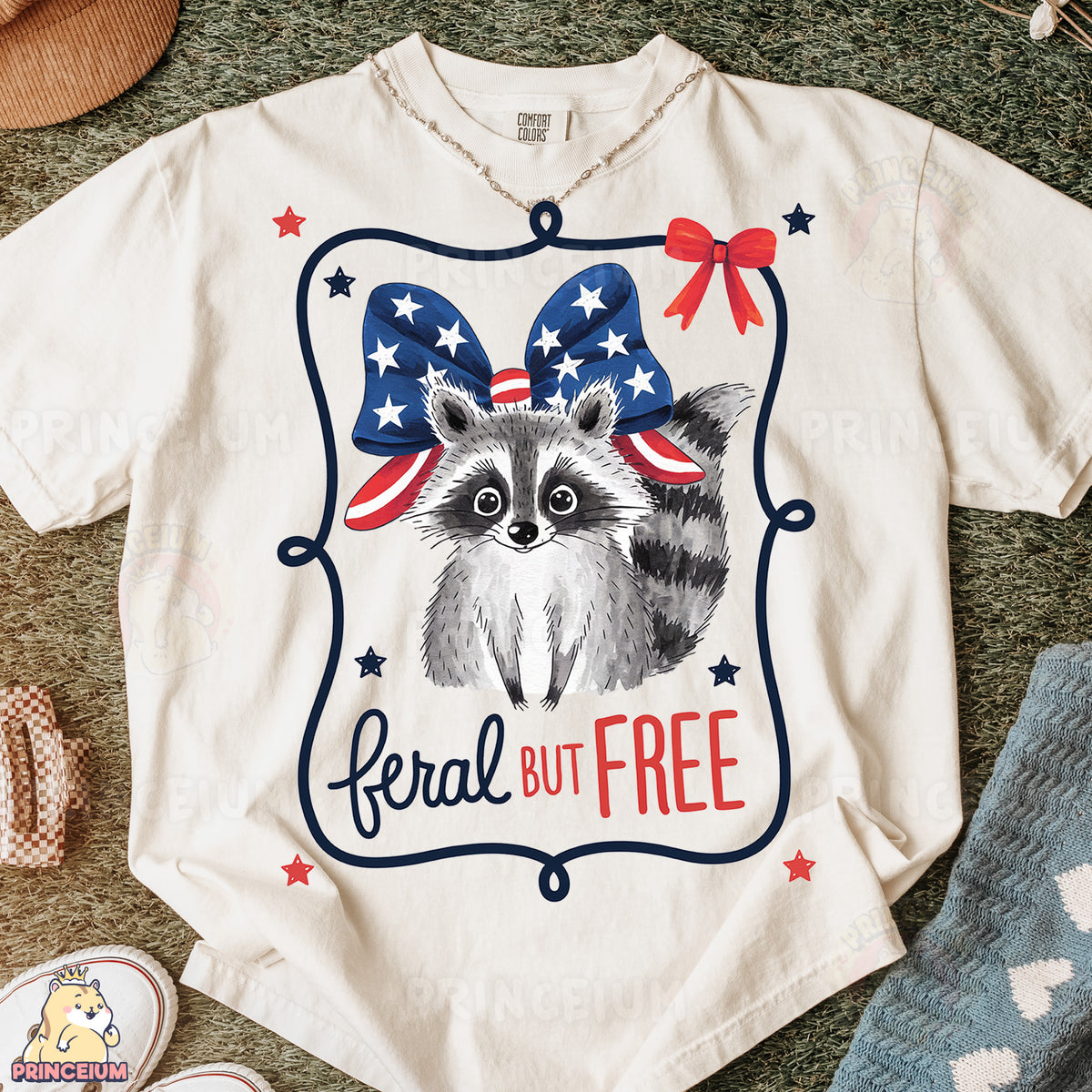 a t - shirt with a raccoon wearing a bow on it