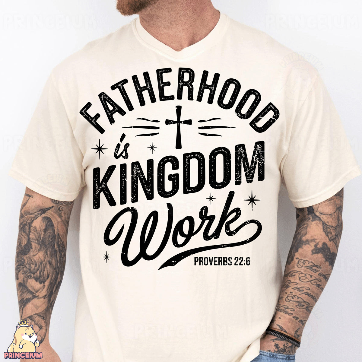 a man wearing a t - shirt that says fatherhood is kingdom work
