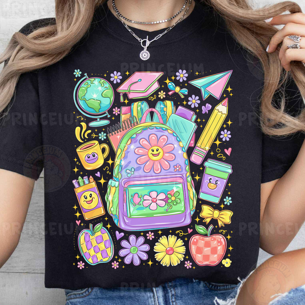 a woman wearing a black tshirt with a backpack on it