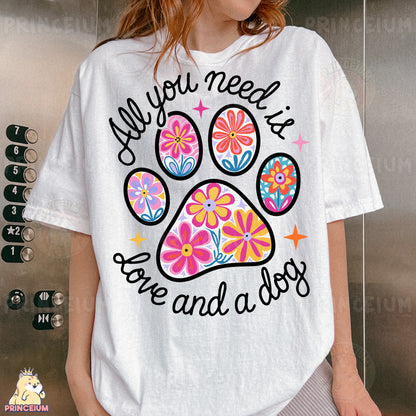 a woman wearing a t - shirt with a dog paw on it