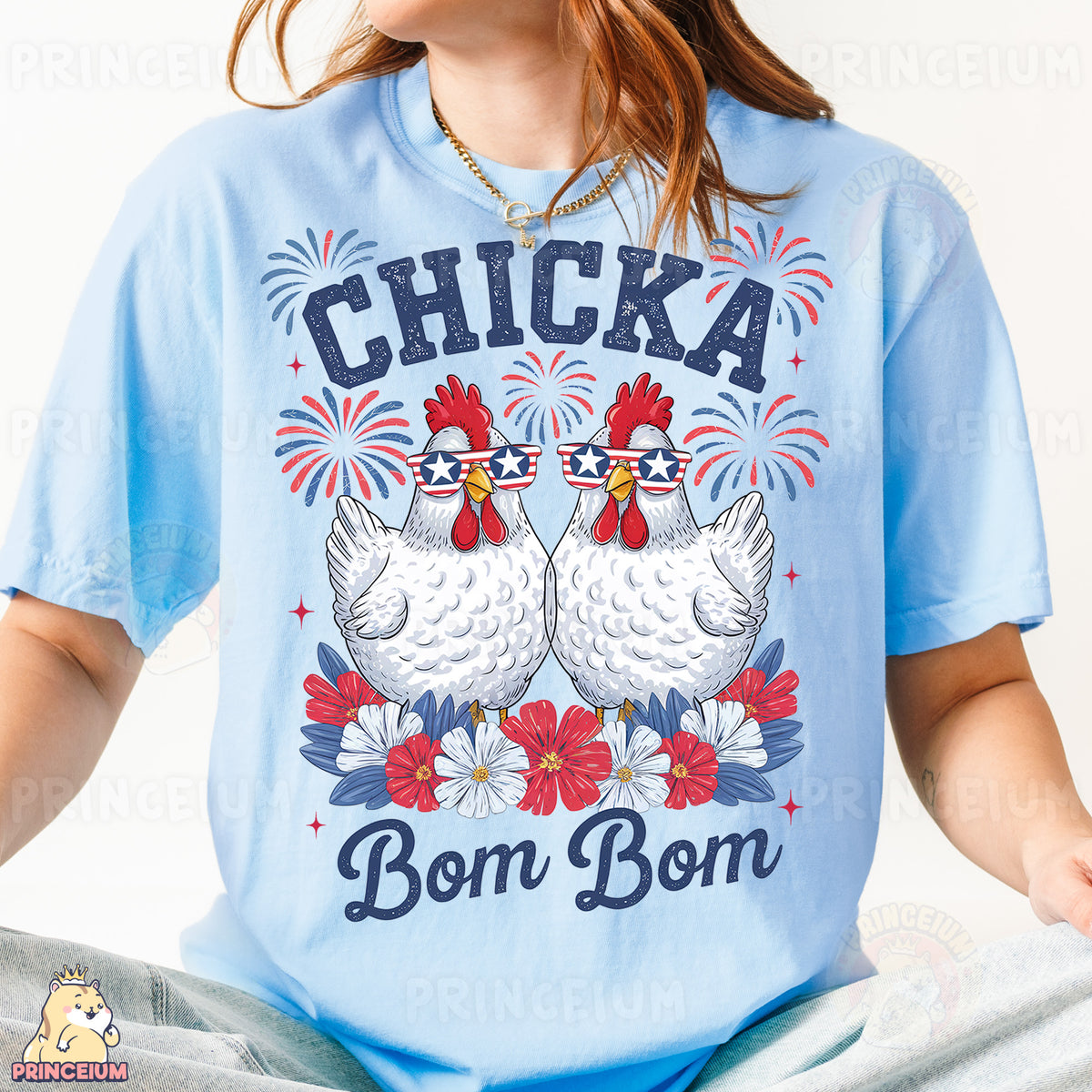 a woman wearing a blue shirt with two chickens on it