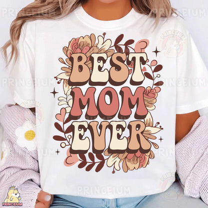 a woman wearing a t - shirt that says best mom ever