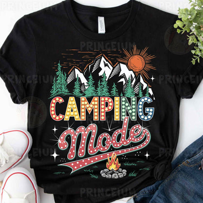 a t - shirt that says camping mode with mountains in the background
