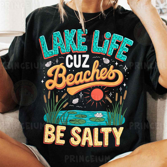 a woman sitting on a couch wearing a lake life t - shirt