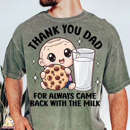 a man holding a cookie and a glass of milk