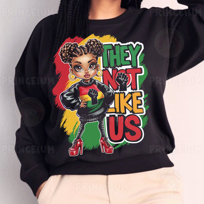 a woman wearing a black sweatshirt with an afro girl on it