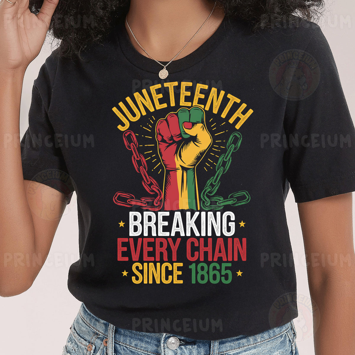 a woman wearing a black t - shirt with the words juneteeth breaking every
