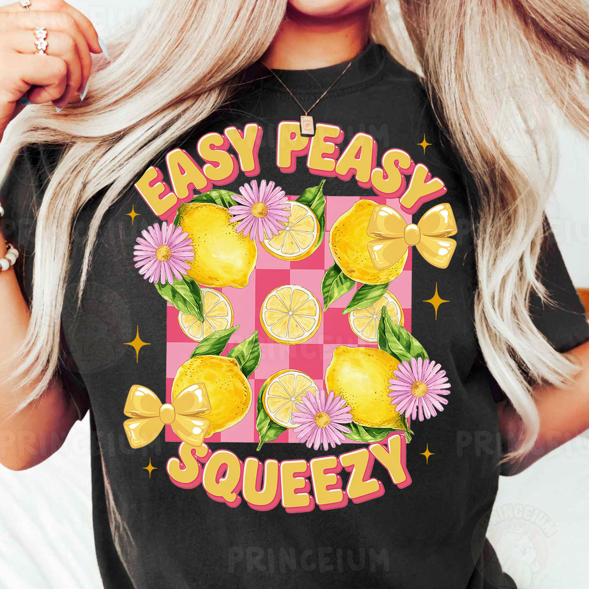 a woman wearing a t - shirt that says easy peasy squeezey