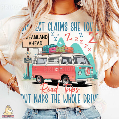 a woman wearing a t - shirt with a vw van on it