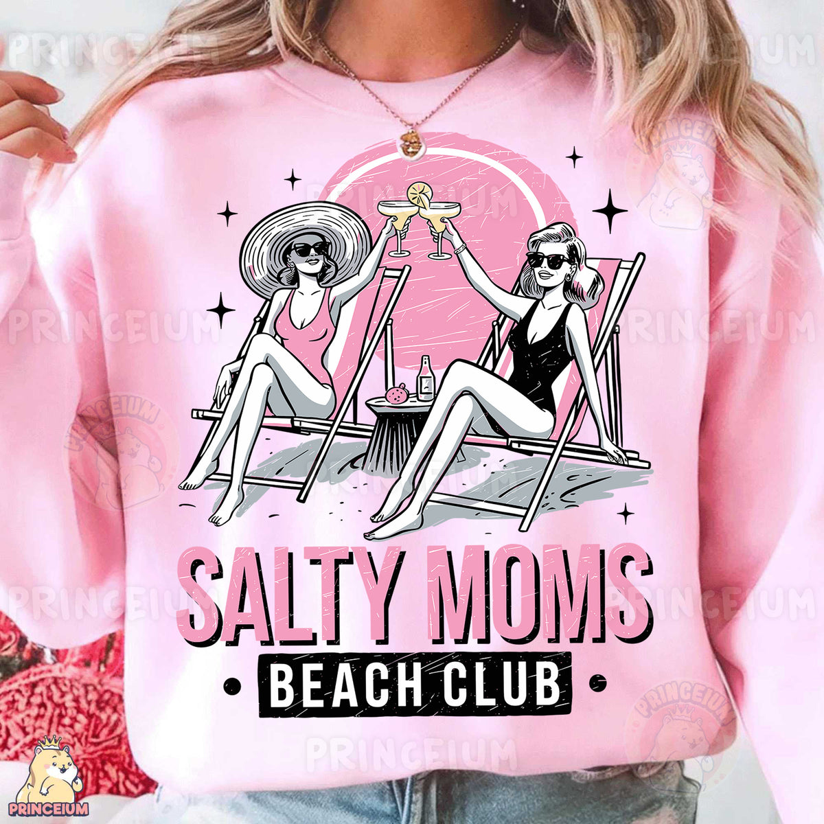 a woman wearing a pink shirt that says salty moms beach club