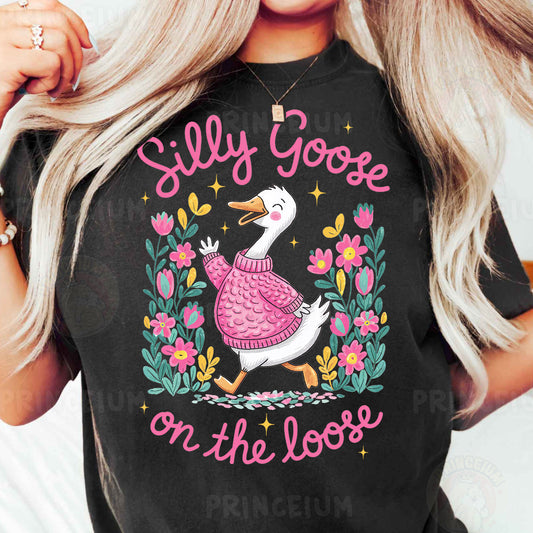 a woman wearing a t - shirt with a goose on it