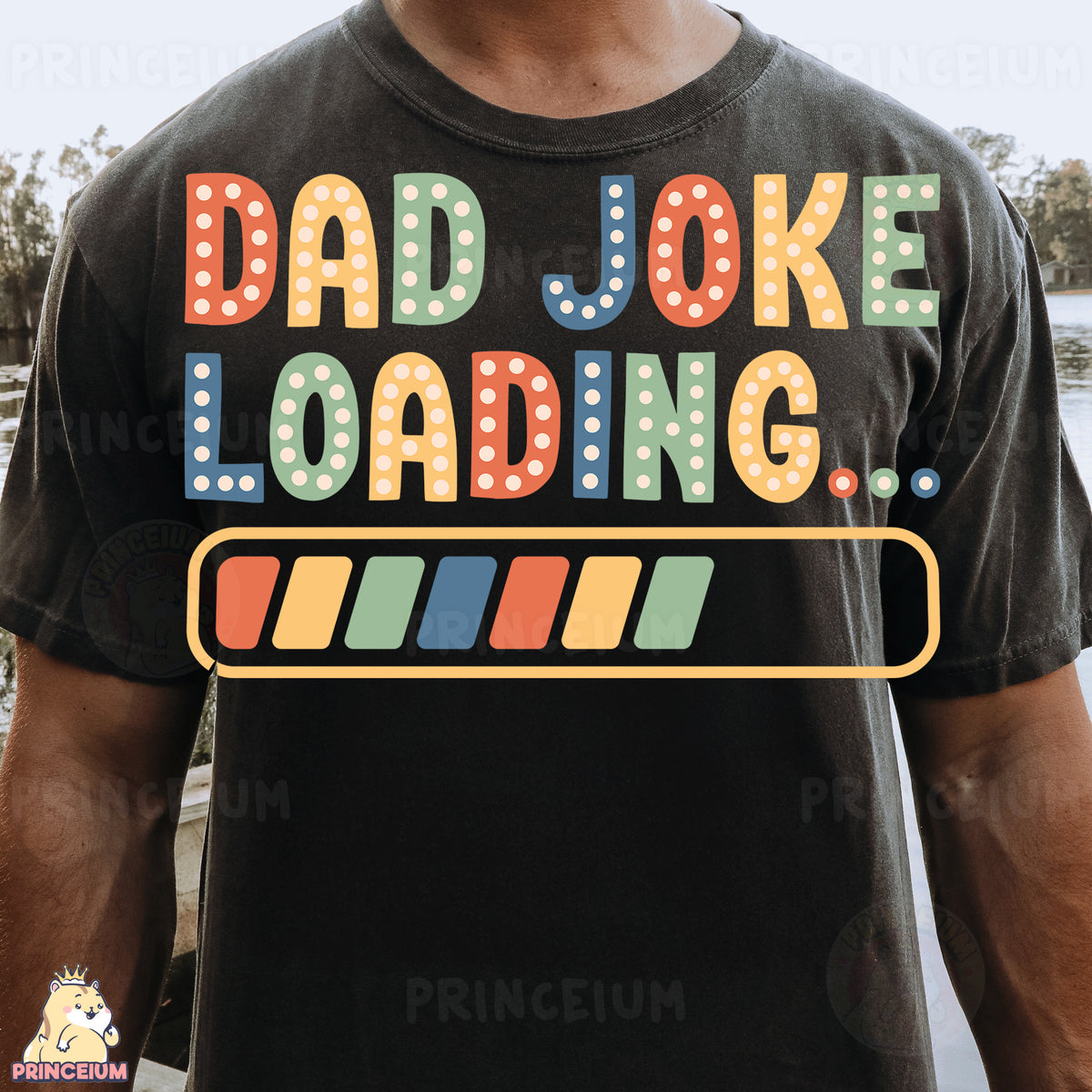 a man wearing a t - shirt that says dad joke loading