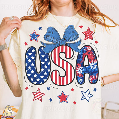 a woman wearing a usa t - shirt with a bow