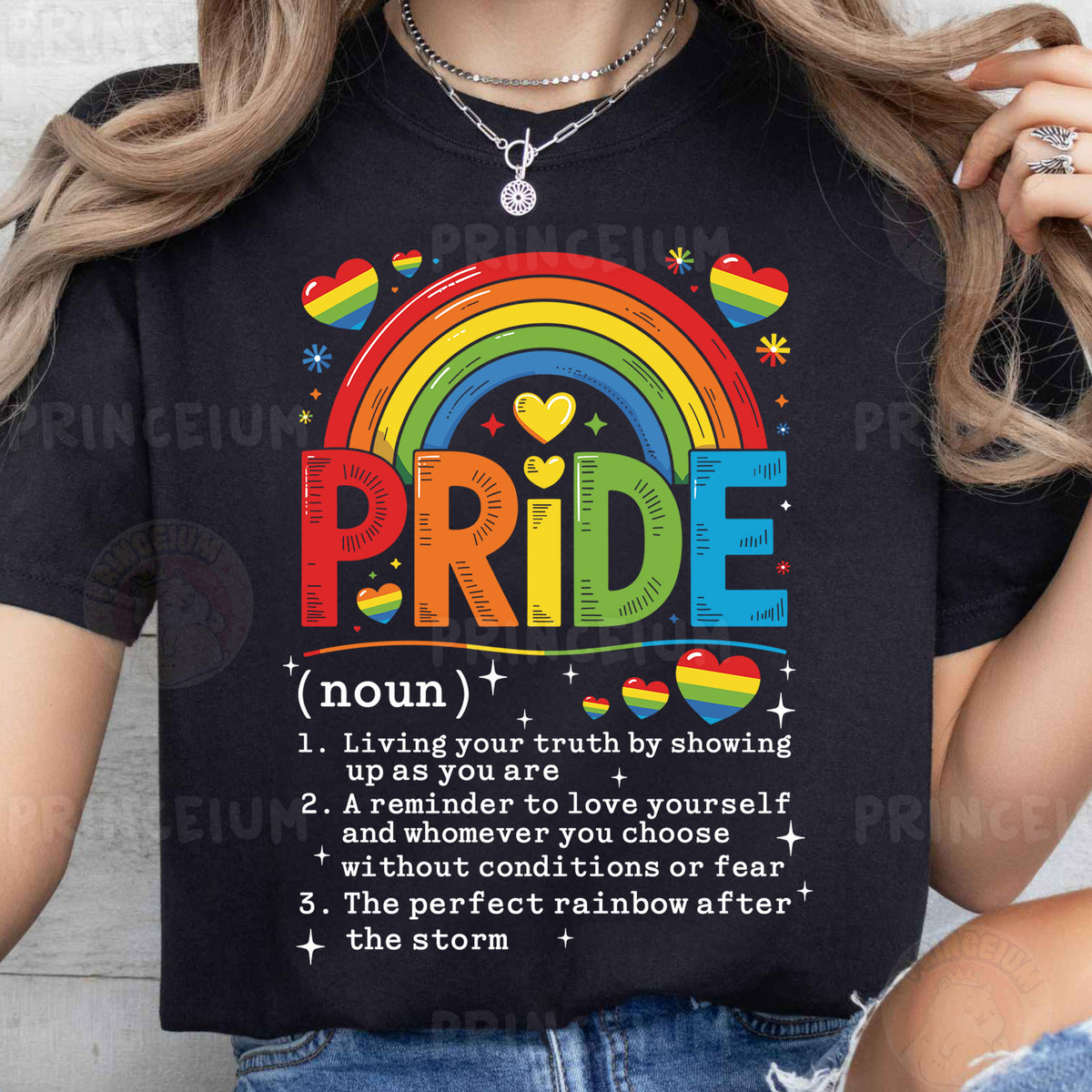 a woman wearing a black pride t - shirt