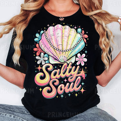 a woman wearing a black t - shirt that says salty soul