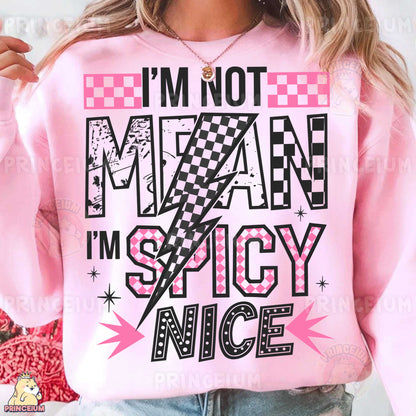 a woman wearing a pink sweatshirt that says i'm not mean i'm