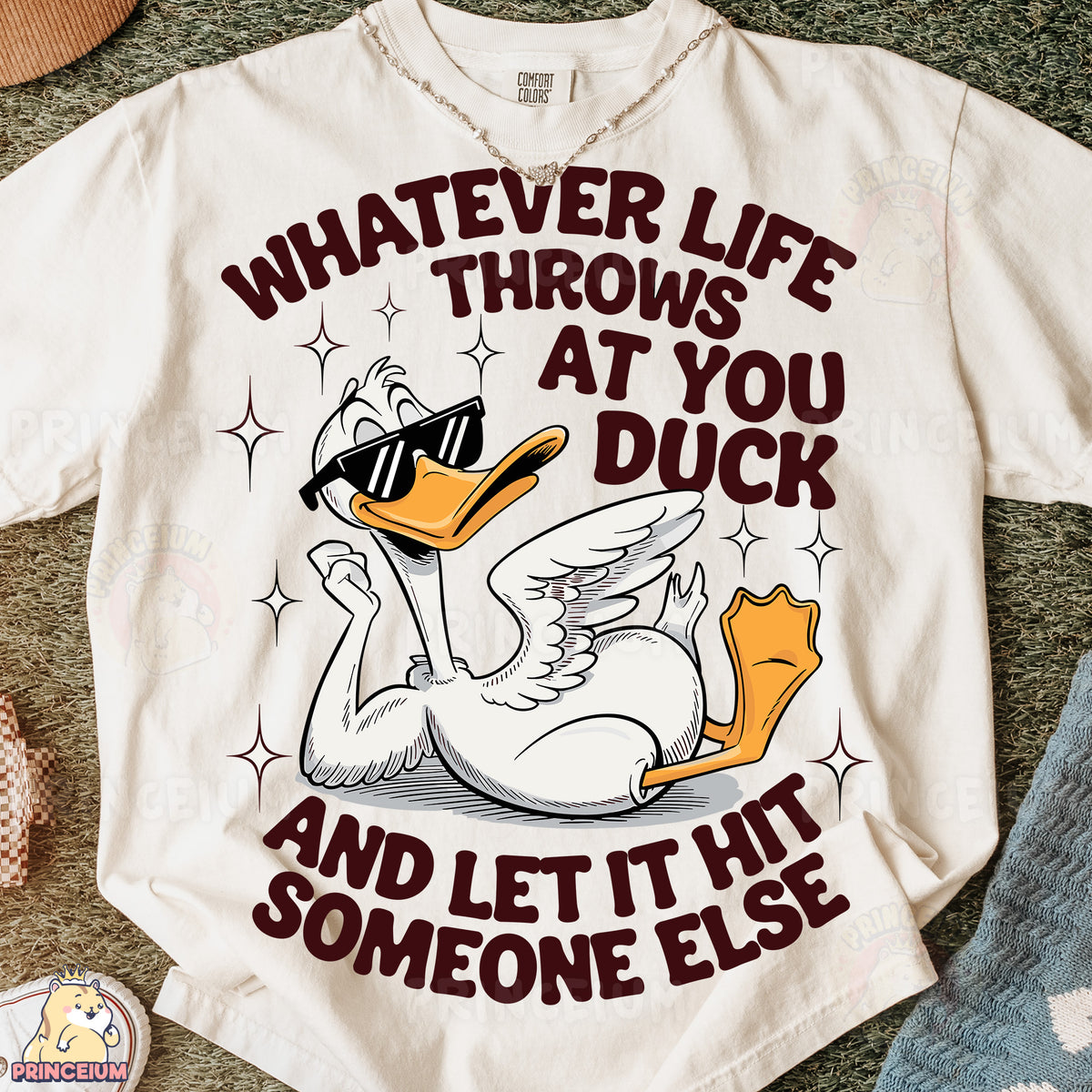 a white shirt with a duck wearing sunglasses