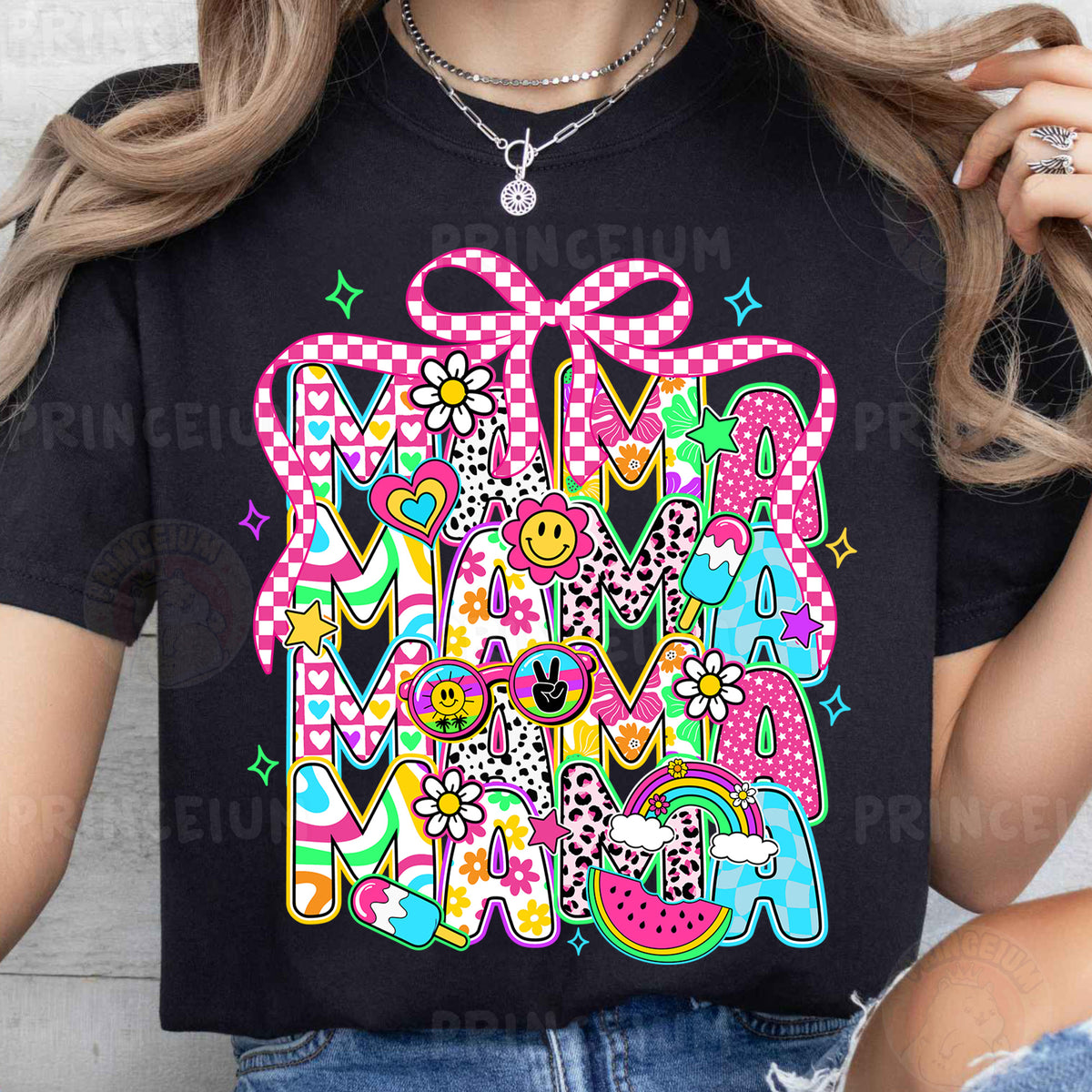 a woman wearing a black t - shirt with the word mama on it