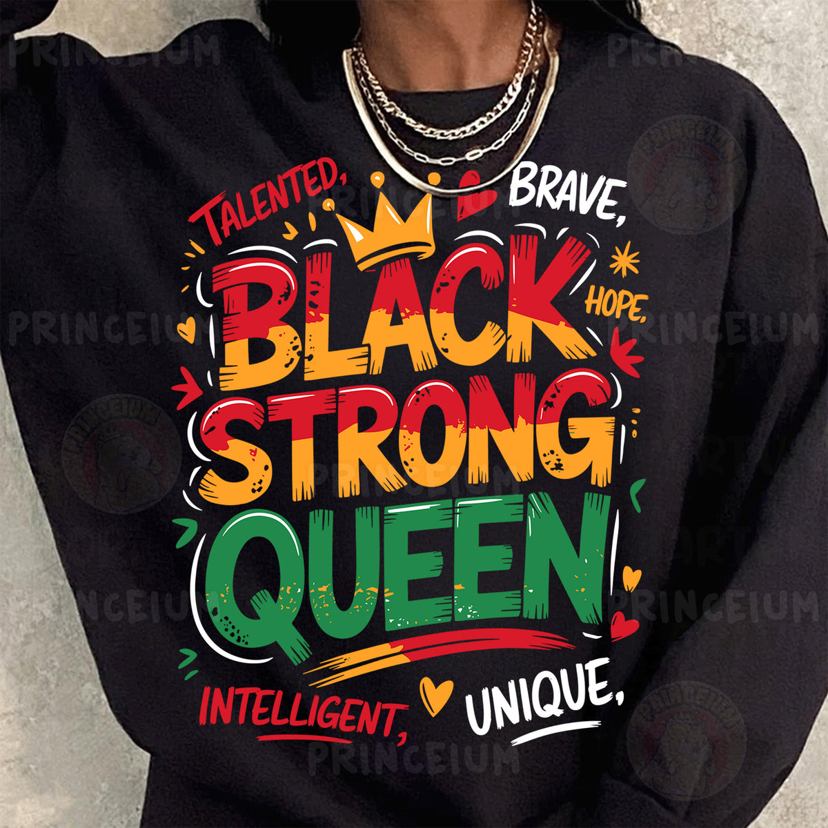 a woman wearing a black sweatshirt with the words black strong queen on it