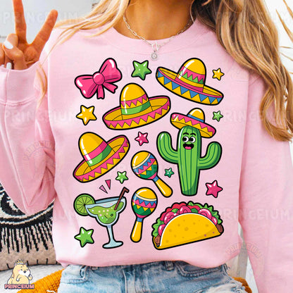 a woman wearing a pink shirt with a mexican themed design on it